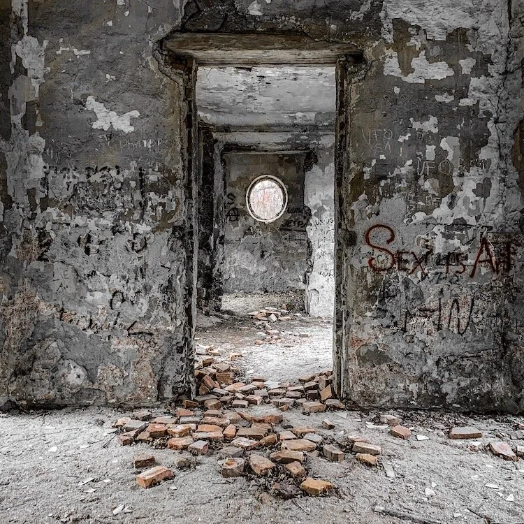 Bricks & door at the abandoned hunting lodge