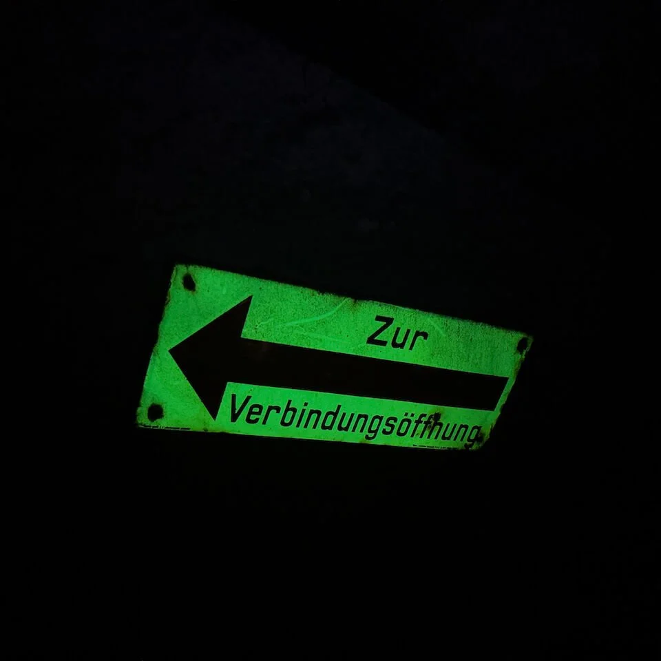 Fluorescent sign in a underground tunnel in Vienna