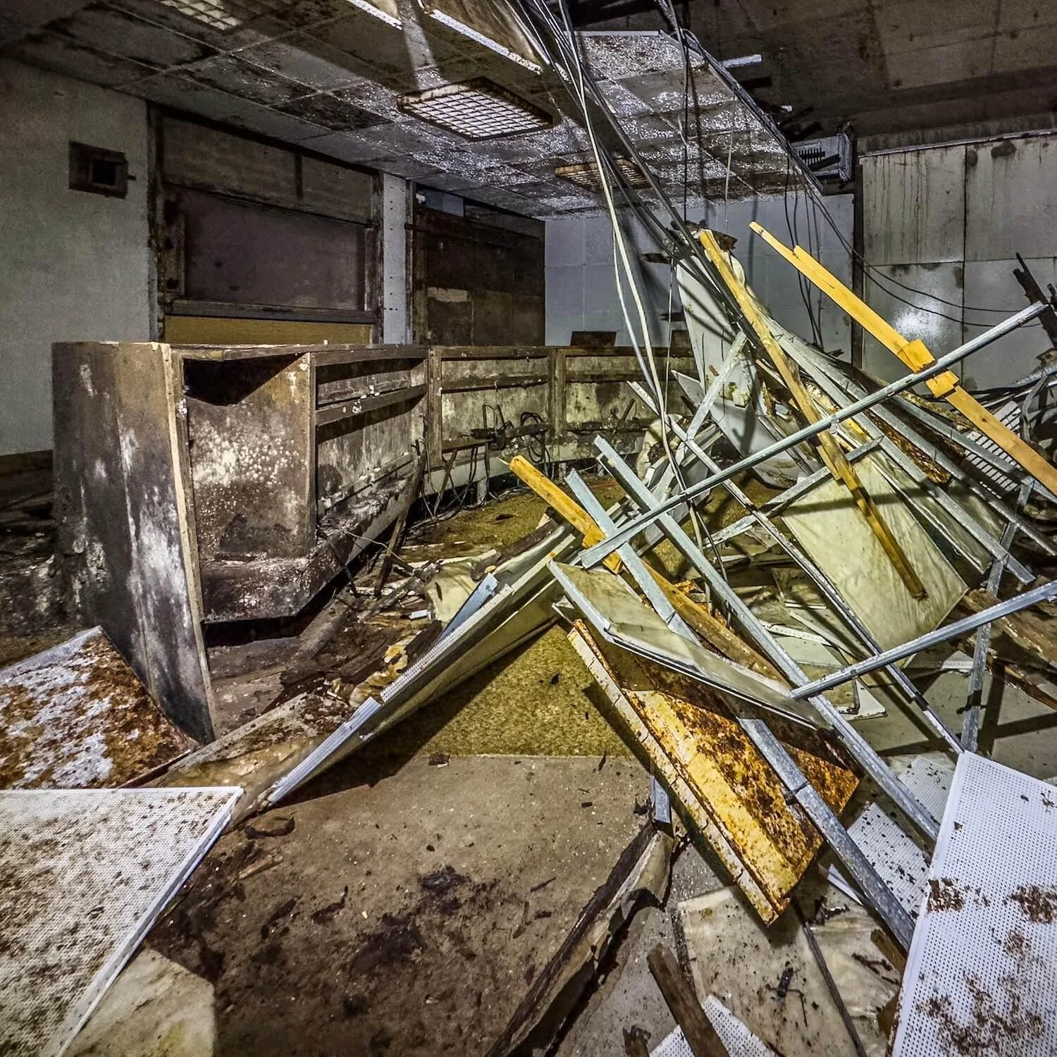 The collapsed control room photographed during my urban exploration tour at the abandoned bunker 7001 Freudenberg in Germany