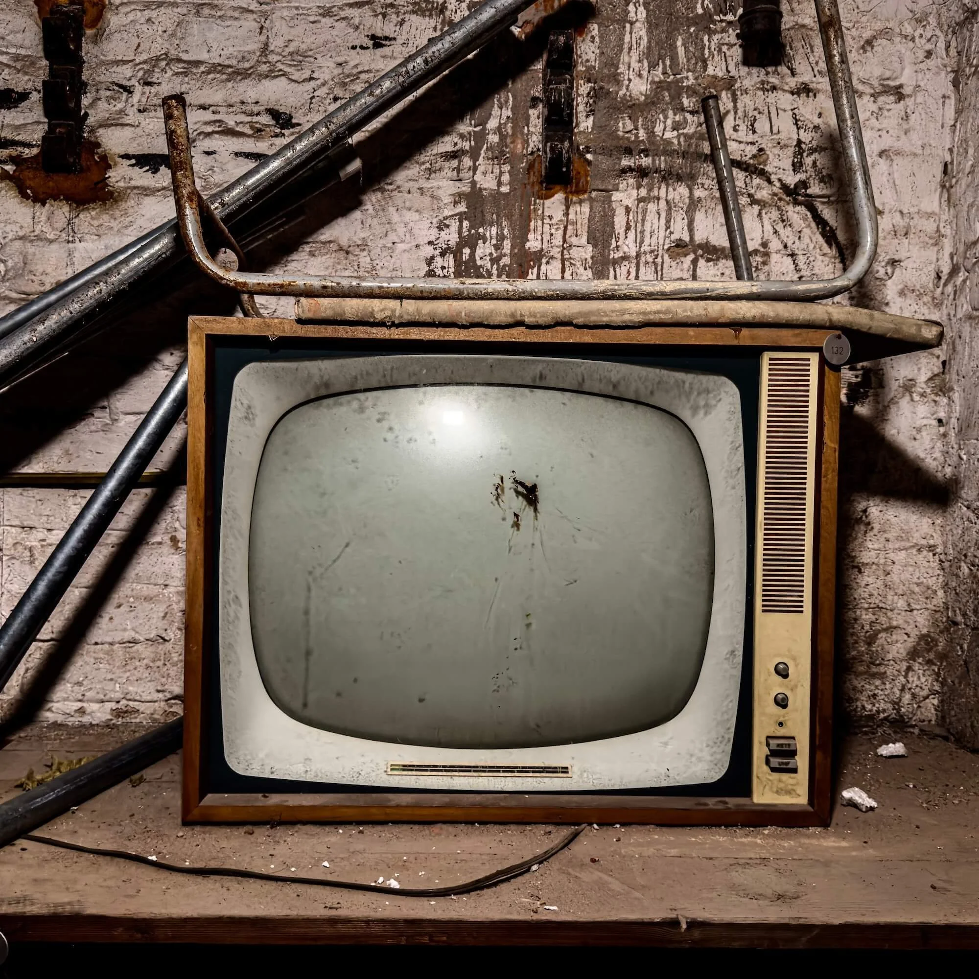 Old TV in the basement of the abandoned Stadtbad Lichtenberg