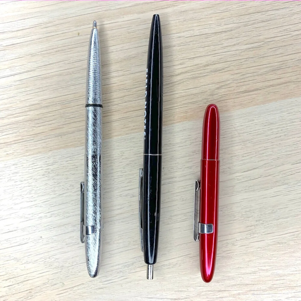 Bullet Space Pen size comparison (from l.t.r.): With cap on the back, normal click pen, with cap closed.